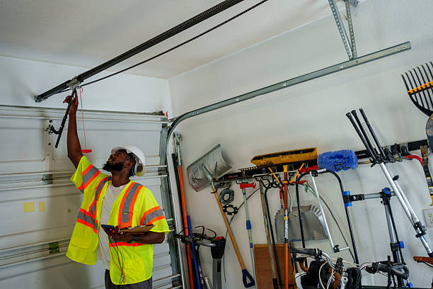 Professional Garage Door Panel Replacement technician working in Englewood, TN